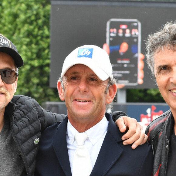 Guilaume Canet, Philippe Rozier et Julien Clerc - Les personnalités assistent au Longines Paris Eiffel Jumping au Champ de Mars, le 27 juin 2021. © Veeren / Bestimage 