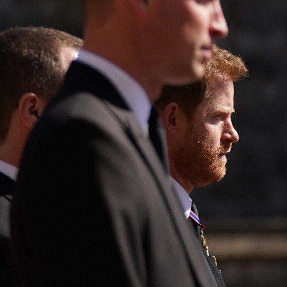 Le Duc de Cambridge (Prince William) et Prince Harry durant les funérailles du Duc d'Edimbourg au Château de Windsor, dans le Berkshire. Le 17 avril 2021.