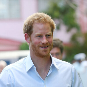 Le prince Harry visite le centre "Joshua House Children" en Guyane dans le cadre de son voyage aux Caraïbes à Georgetown le 4 décembre 2016