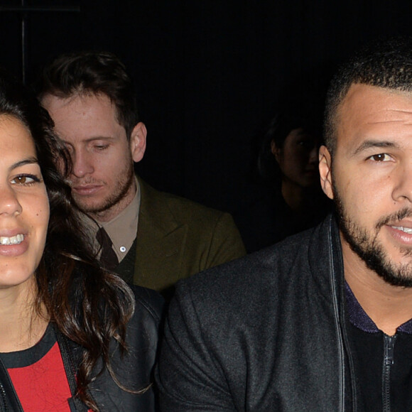 Jo-Wilfried Tsonga et sa compagne Noura au défilé de mode hommes Y-3 collection prêt-à-porter Automne Hiver 2015/2016 au Couvent des Cordeliers à Paris, le 25 janvier 2015.