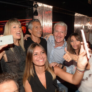 Semi-Exclusif - Didier Deschamps fête sa victoire avec sa femme Claude, Nagui et sa femme Mélanie Page et des amis et au VIP Room à Saint-Tropez, le 21 juillet 2018. © Rachid Bellak/Bestimage