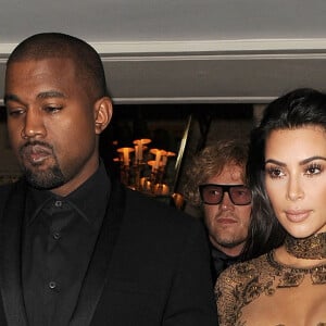 Kim Kardashian et son mari Kanye West arrivent au dîner de gala de "The Vogue 100" à Hyde Park, Londres, le 23 mai 2016.