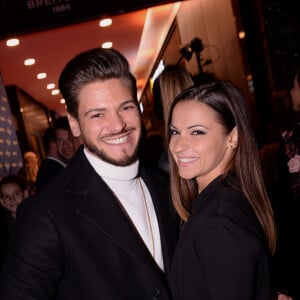 Rayane Bensetti et Denitsa Ikonomova lors de la soirée de réouverture de la boutique "Breitling", située rue de la Paix. Paris. © Rachid Bellak/Bestimage 