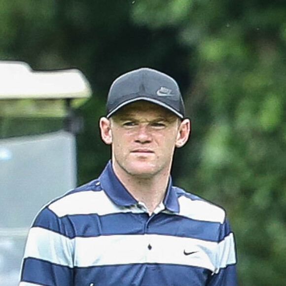 Wayne Rooney - Les joueurs Wayne Rooney, Jamie Vardy et Harry Kane jouent au golf à Chantilly, le 22 juin 2016.
