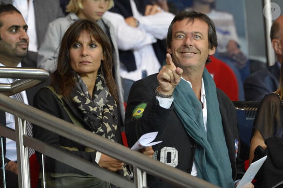 Jean-Luc Reichmann et sa femme Nathalie au match PSG-Bordeaux au Parc des Princes, à Paris le 26 août 2012.