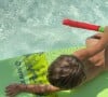 Laure Manaudou a photographié son fils Lou (4 ans) sur une planche de surf. Le 14 août 2021.