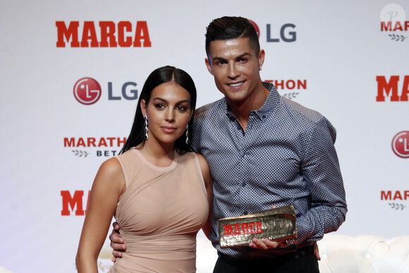 Cristiano Ronaldo et sa compagne Georgina Rodriguez assistent au Prix Marca Leyenda à Madrid en Espagne, le 29 juillet 2019.