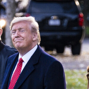 Donald Trump, Melania Trump et leur fils Barron à la Maison-Blanche à Washington, en novembre 2019.