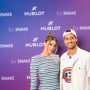 Iris Mittenaere et Diego El Glaoui assistent à la soirée lancement de la montre "Big Bang DJ Snake" de Hublot à l'Accor Arena. Paris, le 2 septembre 2021.