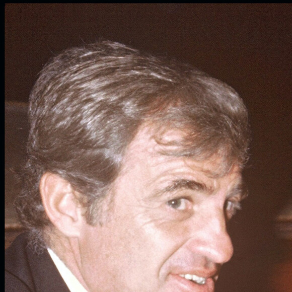 Jean-Paul Belmondo et Carlos Sotto Mayor en soirée à Paris en 1982.