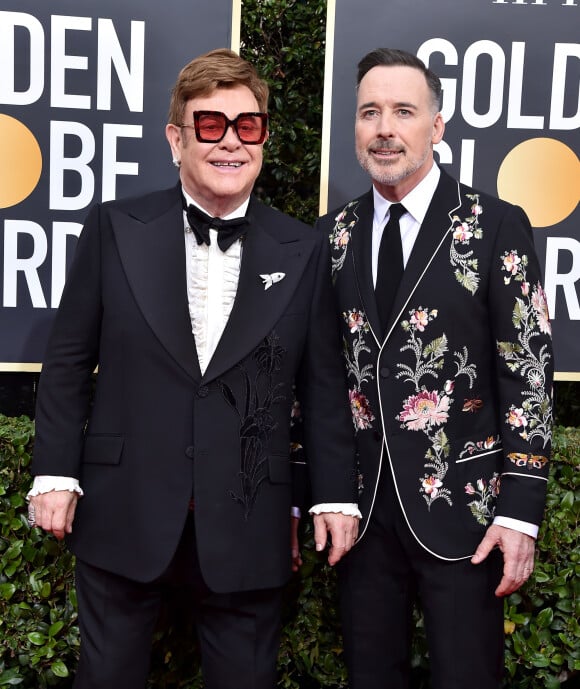 Elton John et son mari David Furnish - Photocall de la 77ème cérémonie annuelle des Golden Globe Awards au Beverly Hilton Hotel à Los Angeles, le 5 janvier 2020.