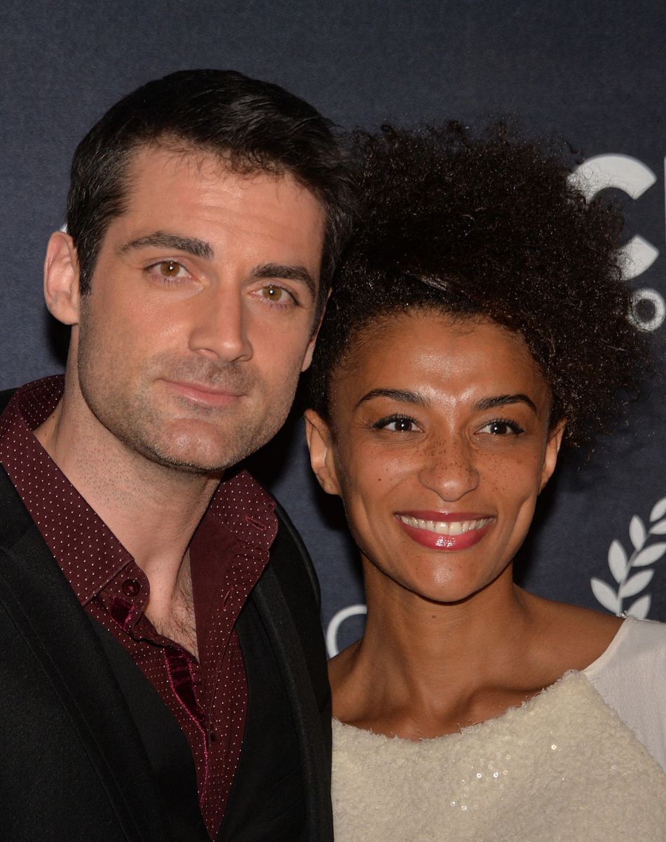 Gil Alma et sa compagne Aminata - Photocall de la 10ème cérémonie des Globes de Cristal au Lido à Paris, le 13 avril 2015.