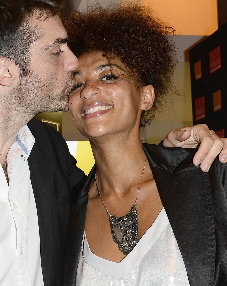 Gil Alma et sa compagne Aminata - People à la soirée Orange lors du Mondial de l'Automobile 2014 au Parc des Expositions de la porte de Versailles à Paris, le 2 octobre 2014.