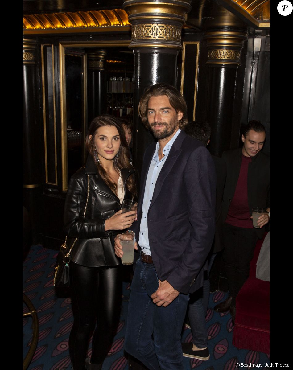 Camille Lacourt et sa compagne Alice Detollenaere (Miss Bourgogne 2010) lors de la soirée de lancement de la vodka "Touché" (vodka parisienne) au restaurant Castel à Paris, France, le 26 septembre 2019. © Jack Tribeca/Bestimage