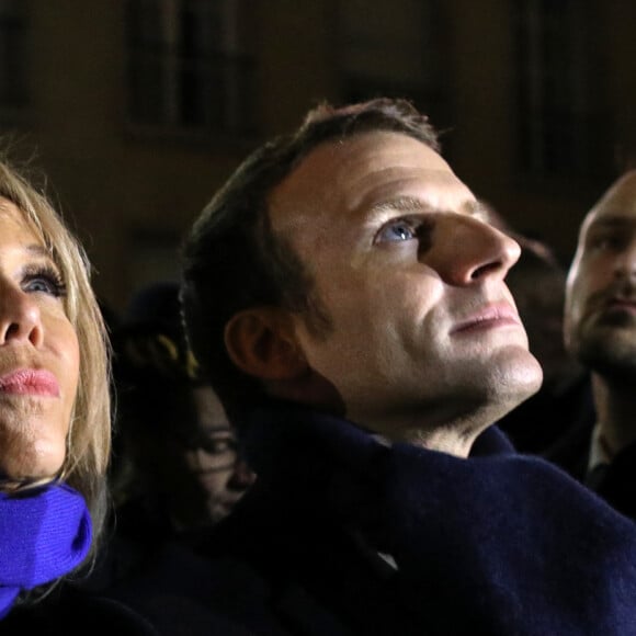 Le président de la République Française Emmanuel Macron et la Première dame Brigitte Macron assistent au lancement du spectacle son et lumière "Chroma" sur la façade de la cathédrale d'Amiens pour l'inauguration du cycle commémoratif du 800ème anniversaire de la cathédrale. Amiens, le 20 novembre 2019.