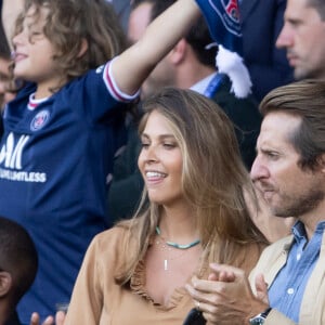 Ophélie Meunier (enceinte) et son mari Mathieu Vergne - People en tribune lors de la rencontre de football Paris Saint Germain PSG contre Clermont (4-0) au Parc des Princes à Paris le 11 septembre 2021