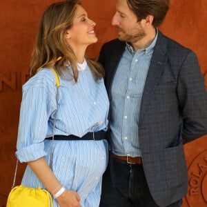 Ophélie Meunier (enceinte) et son mari Mathieu Vergne au village des Internationaux de France de Roland Garros à Paris le 9 juin 2021. © Dominique Jacovides / Bestimage