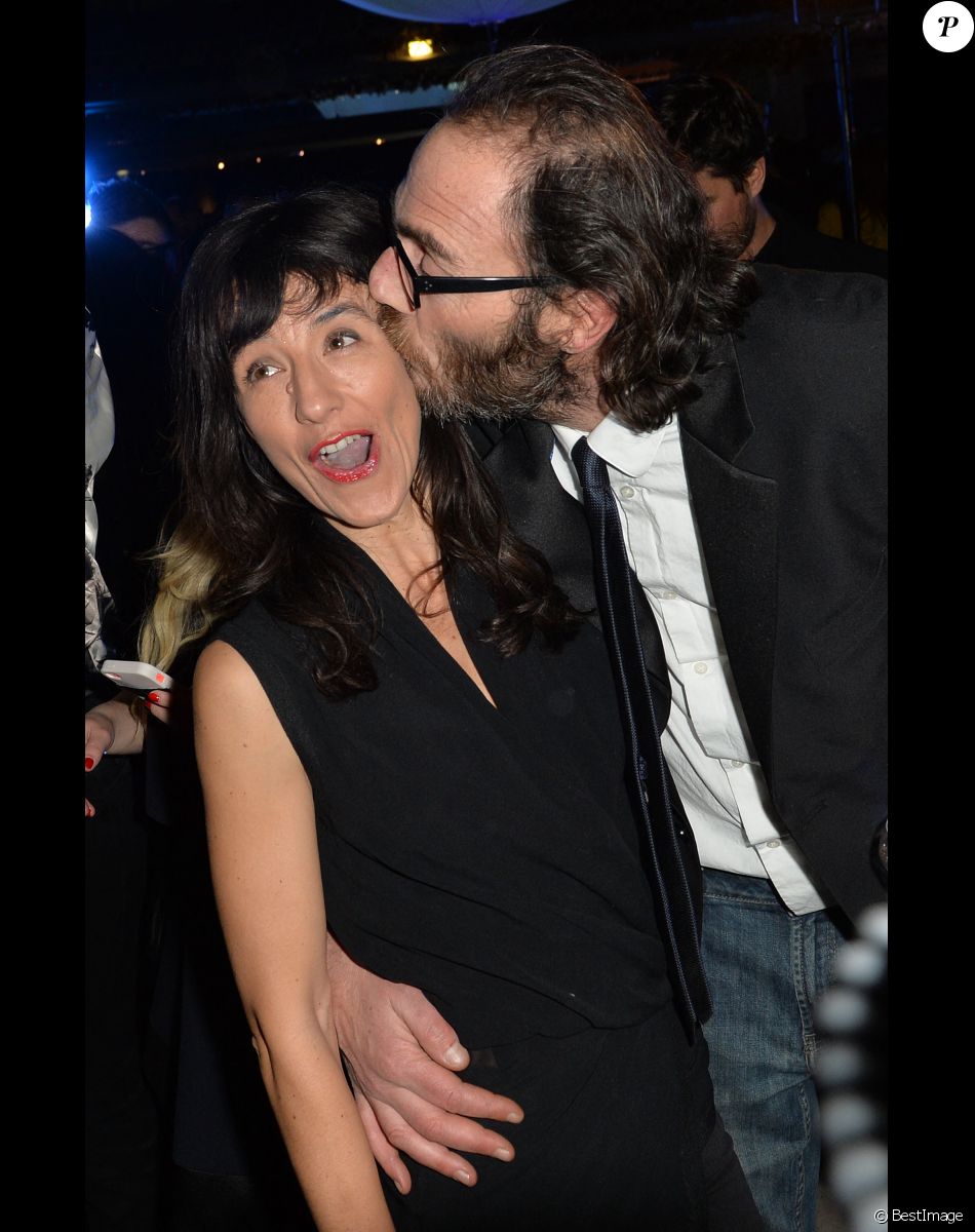 Romane Bohringer et son compagnon Philippe Rebbot - Cocktail lors de la présentation de la nouvelle étoile de la galaxie "Angel" de Thierry Mugler. Paris, le 30 janvier 2015.