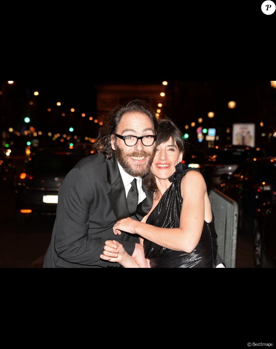 Romane Bohringer et son compagnon Philippe Rebbot - 10e cérémonie des Globes de Cristal au Lido à Paris, le 13 avril 2015.