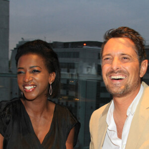 Exclusif - Hapsatou Sy et son mari Vincent Cerruti - Le Grand Dîner du 14 juillet, sur le rooftop de l'hôtel Pullman Tour Eiffel à Paris, France, le 14 juillet 2021. © Philippe Baldini/Bestimage