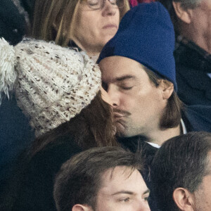 Camille Lacourt et sa compagne Alice Detollenaere (Miss Bourgogne 2010) dans les tribunes lors du match de championnat de Ligue 1 Conforama opposant le Paris Saint-Germain (PSG) aux Girondins de Bordeaux au Parc des Princes à Paris, France, le 23 février 2020. Le PSG a gagné 4-3. © Cyril Moreau/Bestimage