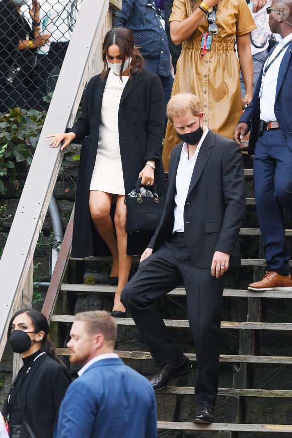Le prince Harry, duc de Sussex et Meghan Markle quittent le "Global Citizen Live Festival" à Central Park à New York, le 25 septembre 2021.