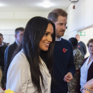 Le prince Harry et Meghan Markle lors d'une rencontre avec les familles de militaires déployés au centre Broom Farm Community Center à Windsor, quelques mois avant leur départ de la monarchie. © Sgt Paul Randall/MoD via Bestimage