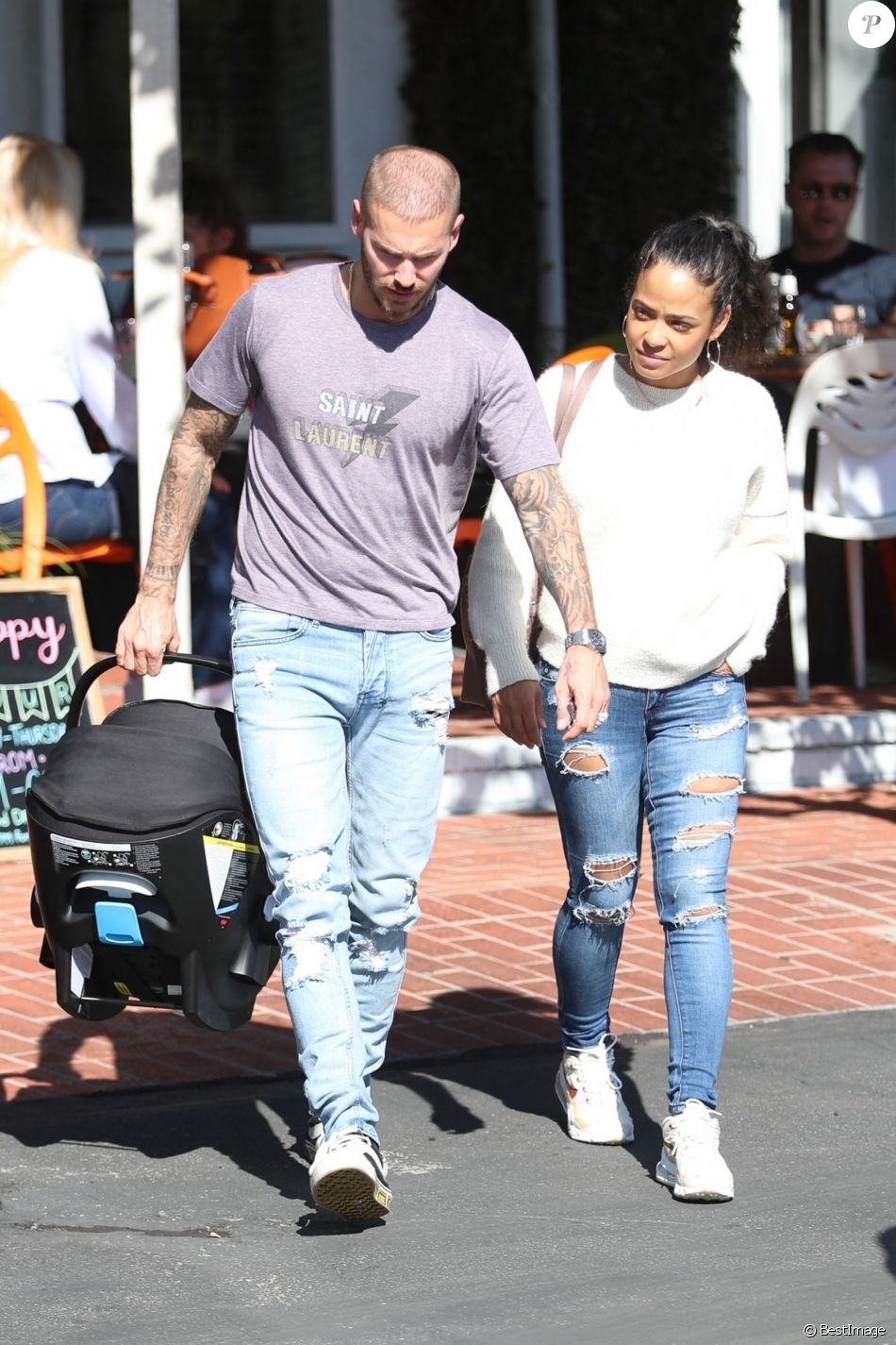 Matt Pokora et sa compagne Christina Milian se baladent avec leur fils