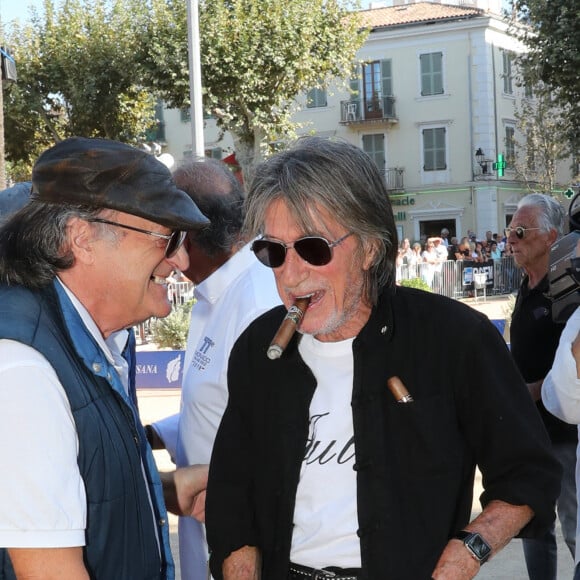 Semi-exclusif - Jacques Dutronc - Challenge Henri Salvador 2019, Un tournoi VIP de Pétanque "Souvenir Henri-Salvador" organisé chaque année à l'Ile-Rousse par le Sport Pétanque Ile-Rousse, en Corse, France, le 13 Septembre 2019. S.Vartan est la marraine d'honneur de cette édition 2019; J.Dutronc est venu pour faire le show, avant le coup d'envoi en faisant sauter le bouchon d'une bouteille et d'aller à la rencontre du public. A noter aussi que les "Amies de Julie" étaient là pour poursuivre leur combat pour J.Douib assassinée au mois de Mars dernier à l'Ile-Rousse par son ex-mari et pour toutes les violences faites aux femmes. © Olivier Sanchez/Crystal/Bestimage 