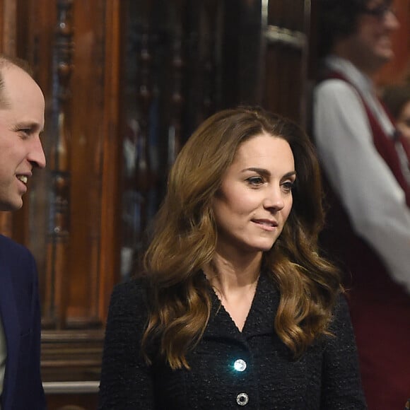 Le prince William, duc de Cambridge, et Kate Middleton, duchesse de Cambridge, quittent le théâtre Noël Coward après la représentation de la comédie musicale "Dear Evan Hansen" à Londres, le 25 février 2020.