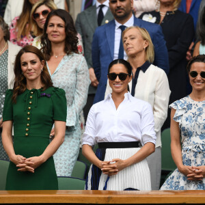 Catherine (Kate) Middleton, duchesse de Cambridge, Meghan Markle, duchesse de Sussex, et Pippa Middleton dans les tribunes lors de la finale femme de Wimbledon "Serena Williams - Simona Halep (2/6 - 2/6) à Londres, le 13 juillet 2019.