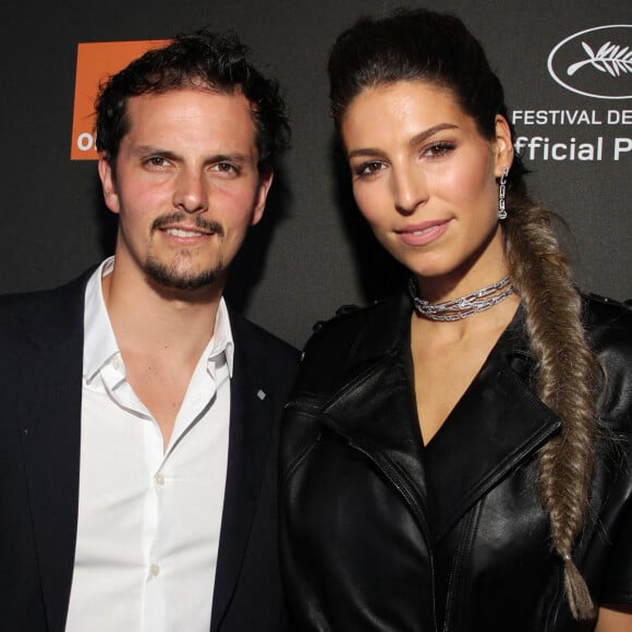 Laury Thilleman et Juan Arbelaez au photocall de la soirée "Orange" sur la plage de l'hôtel Majectic lors du 72ème Festival International du Film de Cannes. © Denis Guignebourg/Bestimage 