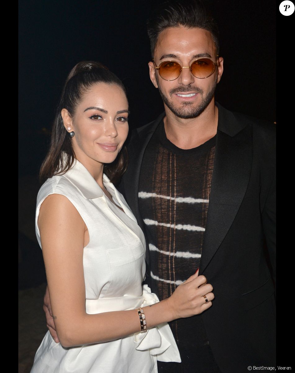 Nabilla Benattia (enceinte) et son mari Thomas Vergara au photocall de l'after party "Magnum x Rita Ora" sur la plage privée Magnum lors du 72ème Festival International du Film de Cannes, France,le 16 mai 2019. © Veeren/Bestimage