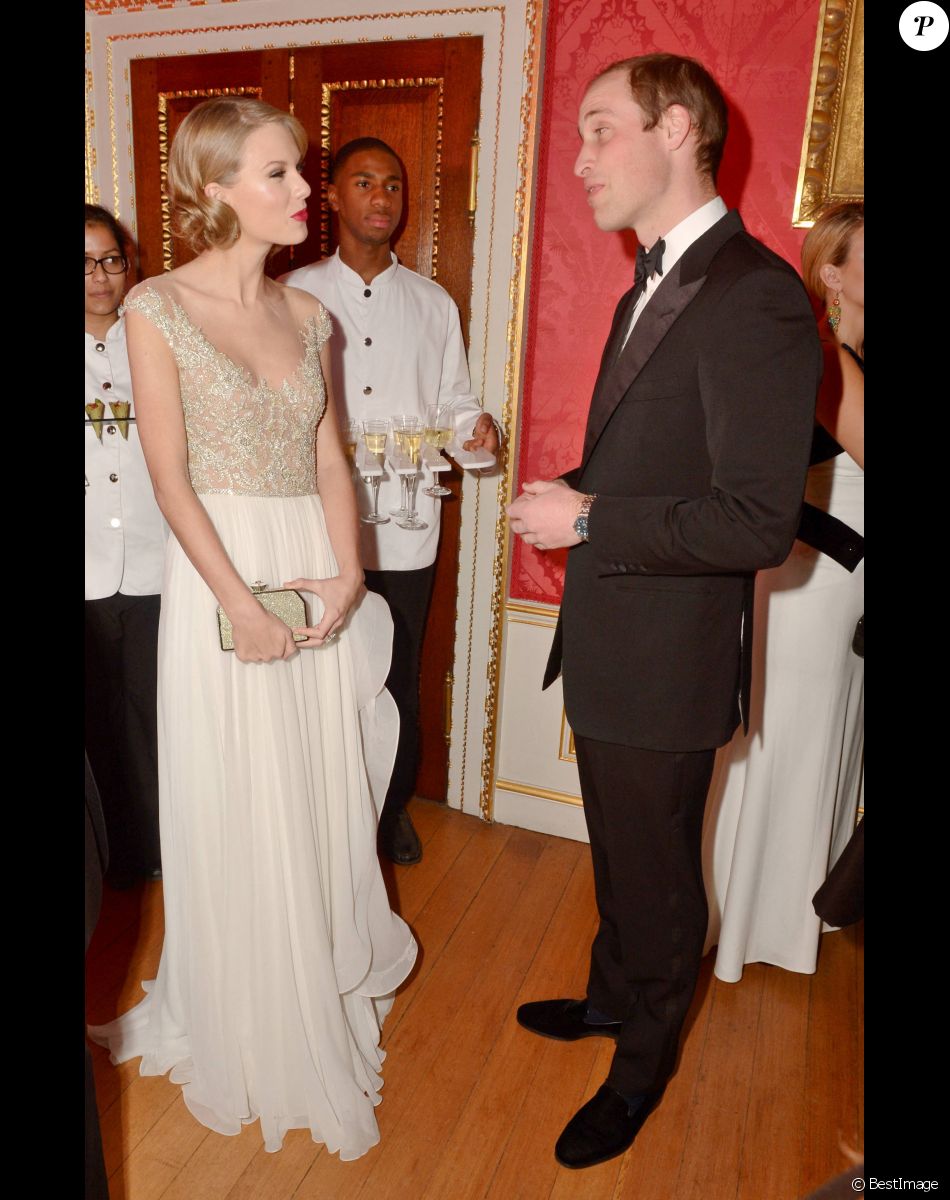 Taylor Swift, le prince William - Diner de gala "Centrepoint Winter Whites" a Londres le 26 novembre 2013.