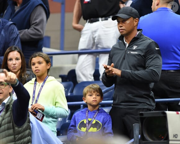 Tiger Woods et ses enfants Charlie et Sam dans les tribunes de l'US Open 2017 à New York, le 8 septembre 2017.