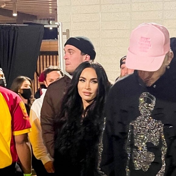 Exclusif - Megan Fox et Machine Gun Kelly assistent au concert caritatif "Free Larry Hoover" de Kanye West et Drake au Memorial Coliseum à Los Angeles, le 9 décembre 2021.