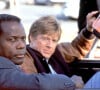 Archives - Sidney Poitier et Robert Redford sur le tournage du film "Les Experts" 1992 
