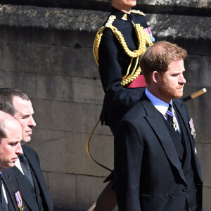 Le prince Harry, duc de Sussex, Peter Phillips, le prince William, duc de Cambridge - Arrivées aux funérailles du prince Philip, duc d'Edimbourg à la chapelle Saint-Georges du château de Windsor, le 17 avril 2021.