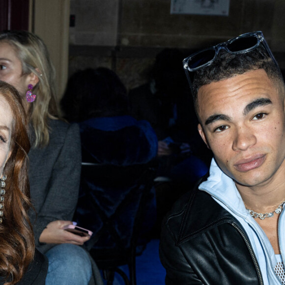 Isabelle Huppert et Théo Christine au front row du défilé Ami automne-hiver 2022/2023 dans le cadre de la Fashion Week de Paris, France, le 19 janvier 2022. Olivier Borde/bestimage 