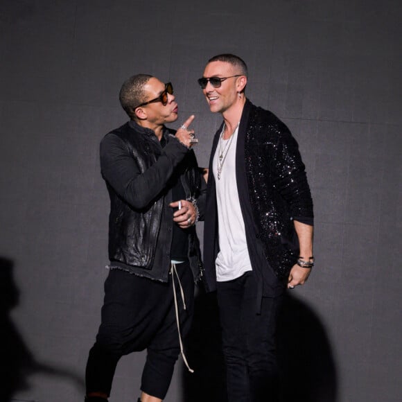 Joeystarr et Maxime Dereymez assistent au défilé On Aura Tout Vu, collection Haute Couture printemps-été 2022. Paris, le 25 janvier 2022.
