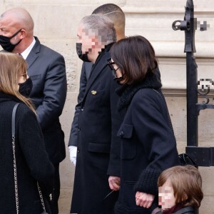 Gaëlle Pietri (ex-compagne du défunt) et son fils Orso, Serge et Christyne Ulliel (parents du défunt) - Sorties des obsèques (bénédiction) de Gaspard Ulliel en l'église Saint-Eustache à Paris. Le 27 janvier 2022 © Jacovides-Moreau / Bestimage