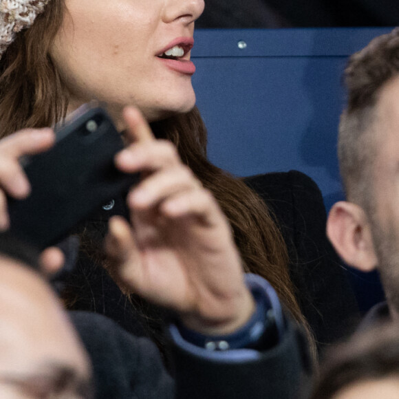 Camille Lacourt et sa compagne Alice Detollenaere (Miss Bourgogne 2010) dans les tribunes lors du match de championnat de Ligue 1 Conforama opposant le Paris Saint-Germain (PSG) aux Girondins de Bordeaux au Parc des Princes à Paris, France, le 23 février 2020. Le PSG a gagné 4-3. © Cyril Moreau/Bestimage