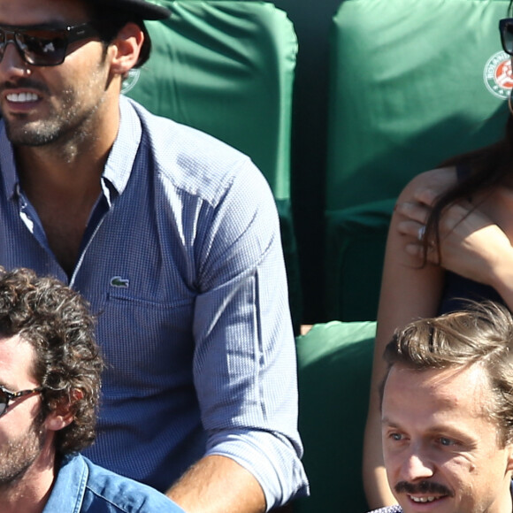 Sofia Essaidi et son compagnon Adrien Galo - People dans les tribunes de Roland Garros lors de la Coupe Davis. Le 12 septembre 2014