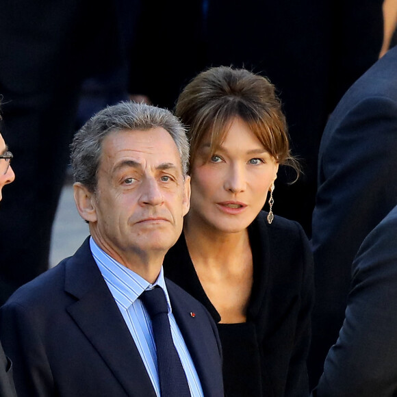 Nicolas Sarkozy, Carla Bruni Sarkozy - Arrivées à l'hommage national à Charles Aznavour à l'Hôtel des Invalides à Paris. Le 5 octobre 2018 © Jacovides-Moreau / Bestimage 