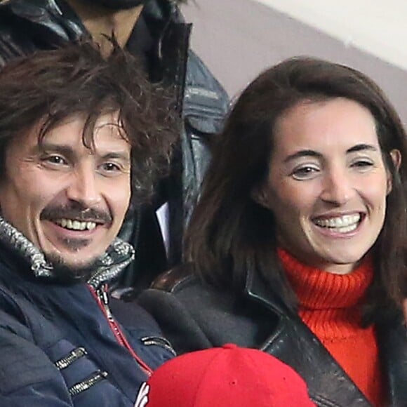Arnaud Tsamere et sa compagne Margot Laffite assistent au match de coupe de France entre le Psg et Lyon au Parc des Princes à Paris, le 10 février 2016. © Cyril Moreau/Bestimage