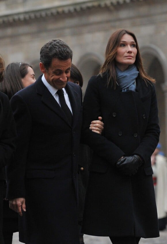 Carla Bruni et Nicolas Sarkozy aux funérailles de Philippe Séguin le 11/01/10 à Paris