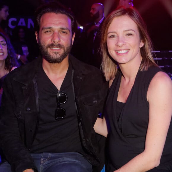 Maxim Nucci (Yodelice) et sa compagne enceinte Isabelle Ithurburu assistent au match de boxe de Tony Yoka au palais des sports de Paris, le 23 juin 2018 © Veeren-CVS/Bestimage