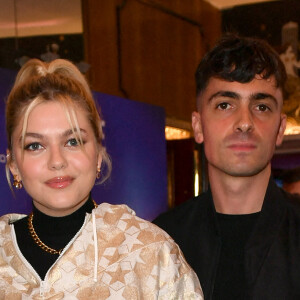 Louane et son compagnon Florian Rossi - Avant Première de " Belle " film animé japonais au Grand Rex à Paris le 6 décembre 2021 . © Veeren / Bestimage 