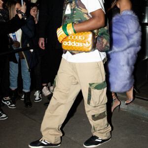 Rihanna enceinte et son compagnon Asap Rocky quittent l'hôtel Four Seasons pour se rendre à la soirée Gucci en marge de la fashion week à Milan le 25 février 2022. Asap Rocky porte la nouvelle collection GucciXAdidas présentée à Milan. © Tiziano Da Silva/Bestimage 