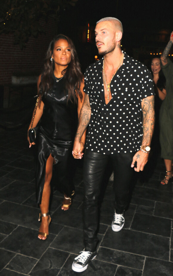 M. Pokora (Matt Pokora) et sa compagne Christina Milian fêtent leurs anniversaires respectifs avec leurs amis au restaurant "Beauty & Essex" à Los Angeles le 26 septembre 2017. Matt est né le 26 septembre 1985 et fête ses 32 ans alors que sa compagne est née le 26 septembre 1981 et fête ses 36 ans. 